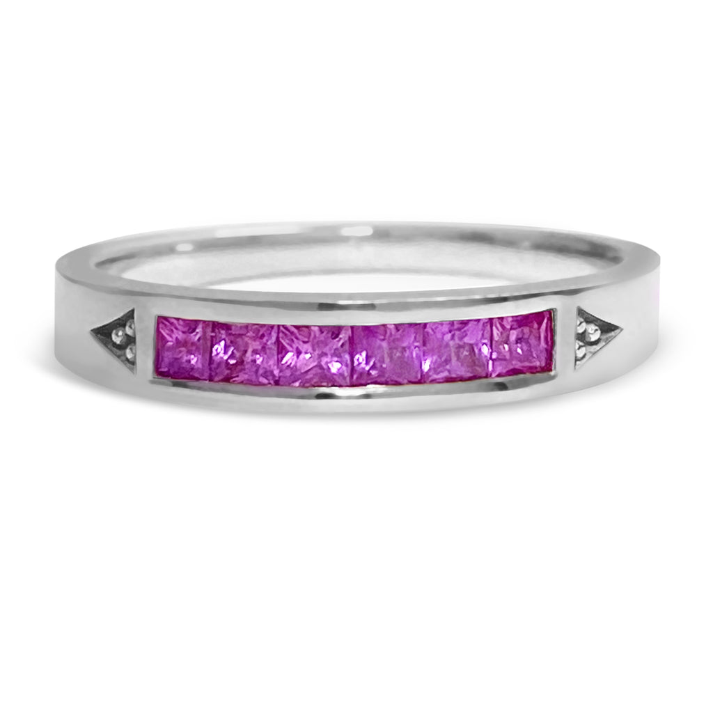 White gold stacking ring with 6 princess bright pinks sapphires.