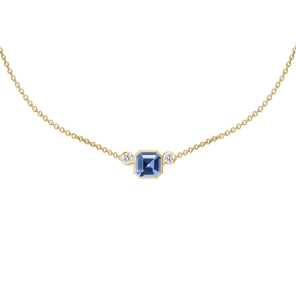 Light Blue Asscher-cut sapphire necklace in 18 karat gold with sparkling diamonds. Limited Edition collection of designer fine jewelry made in Montreal by K8 Jewelry Bijoux.