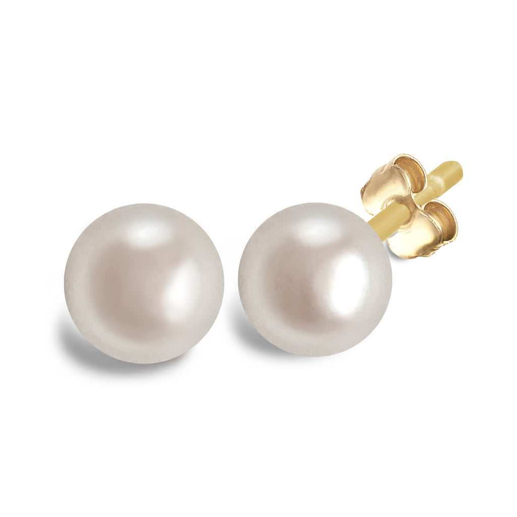 Lustrous white pearl earrings with gold posts on white background. Boucles d'oreilles Akoya tiges en or sur fond blanc. Montréal, Canada