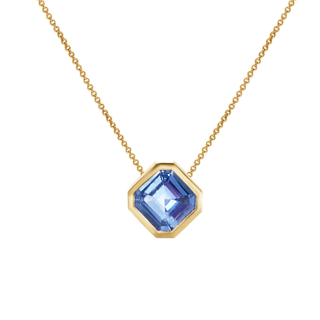 Contemporary 18 karat yellow gold necklace with blue sapphire. Bijoux Montreal.