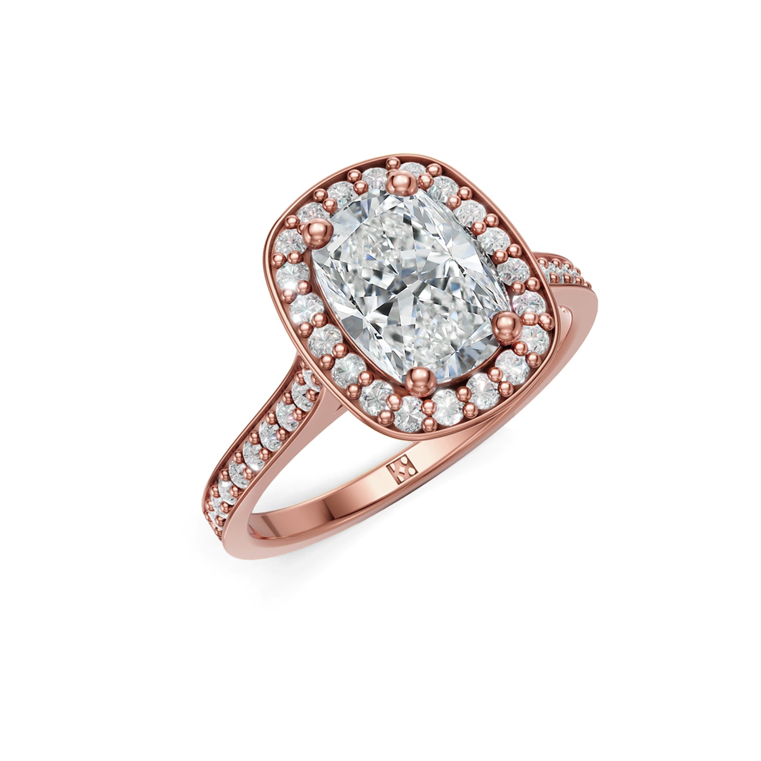 Beautifuly pink or rose gold diamond halo engagement ring with 2 carat centre diamond and a row of bright, white diamonds running down the engagement ring band. Made in Canada. Bague fiançailles à diamants halo . Création Montréal. Style Couture Classique.