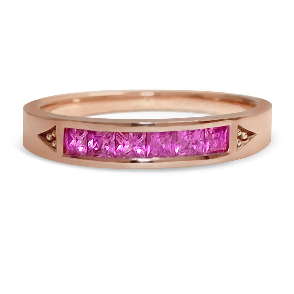 Pink gold stacking ring with 6 princess bright pinks sapphires.