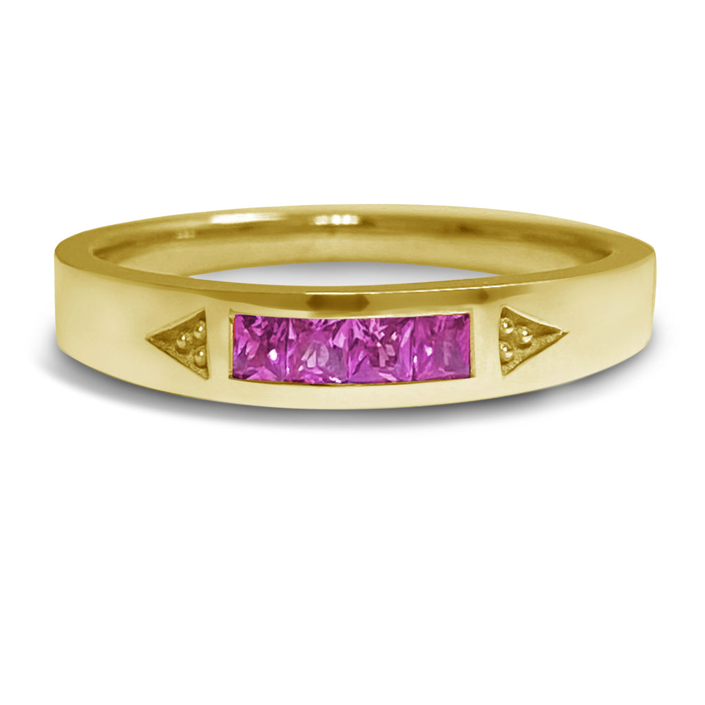 Yellow gold stacking ring with 4 princess bright pinks sapphires.