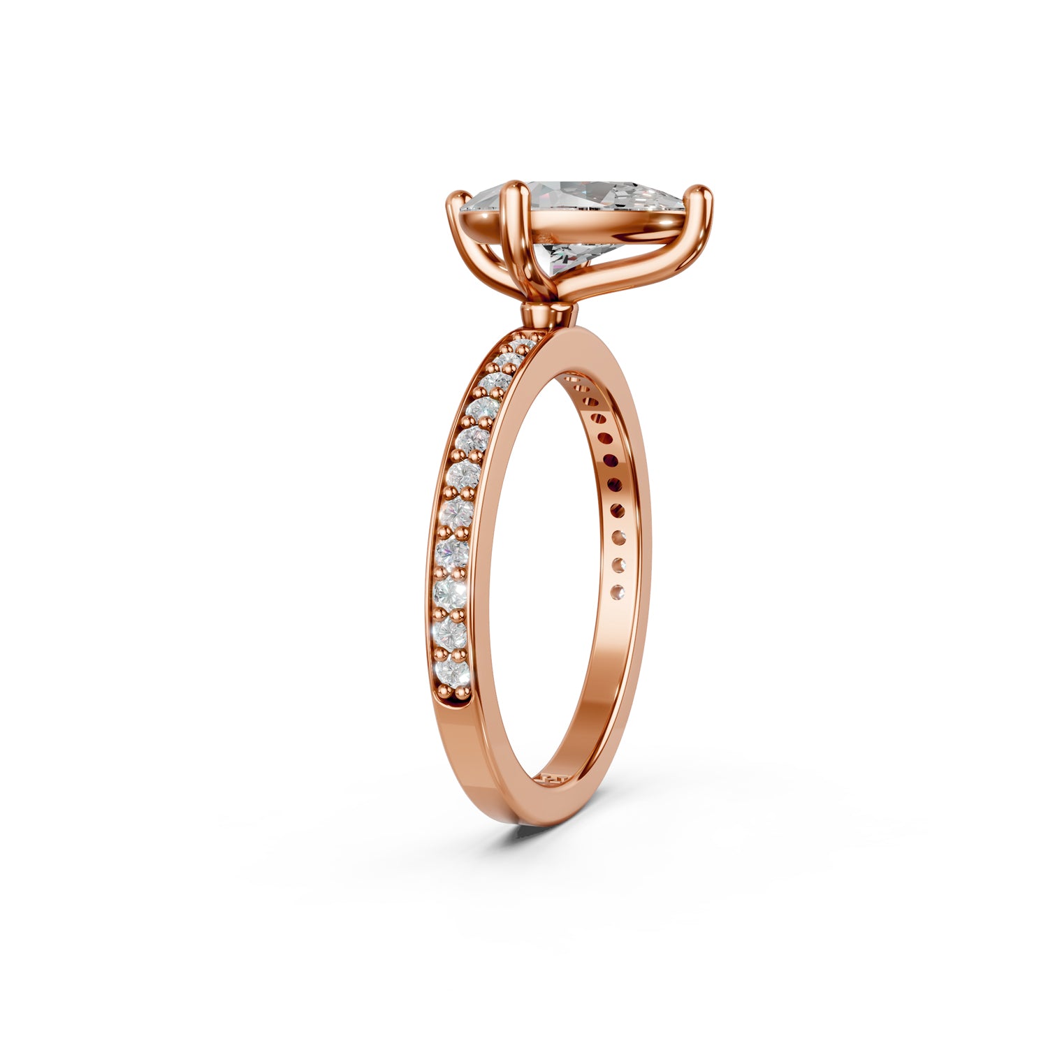 Stunning pink or rose gold Solitaire Engagement Ring with large pear-shaped  diamond and sparkling diamonds running down the narrow band. Made in Montreal. Contemporary and Classic Design. Perfect for a Millennial Bride /  Marriage Montréal Bague de fiancailles haut de gamme Bijoux Montréal