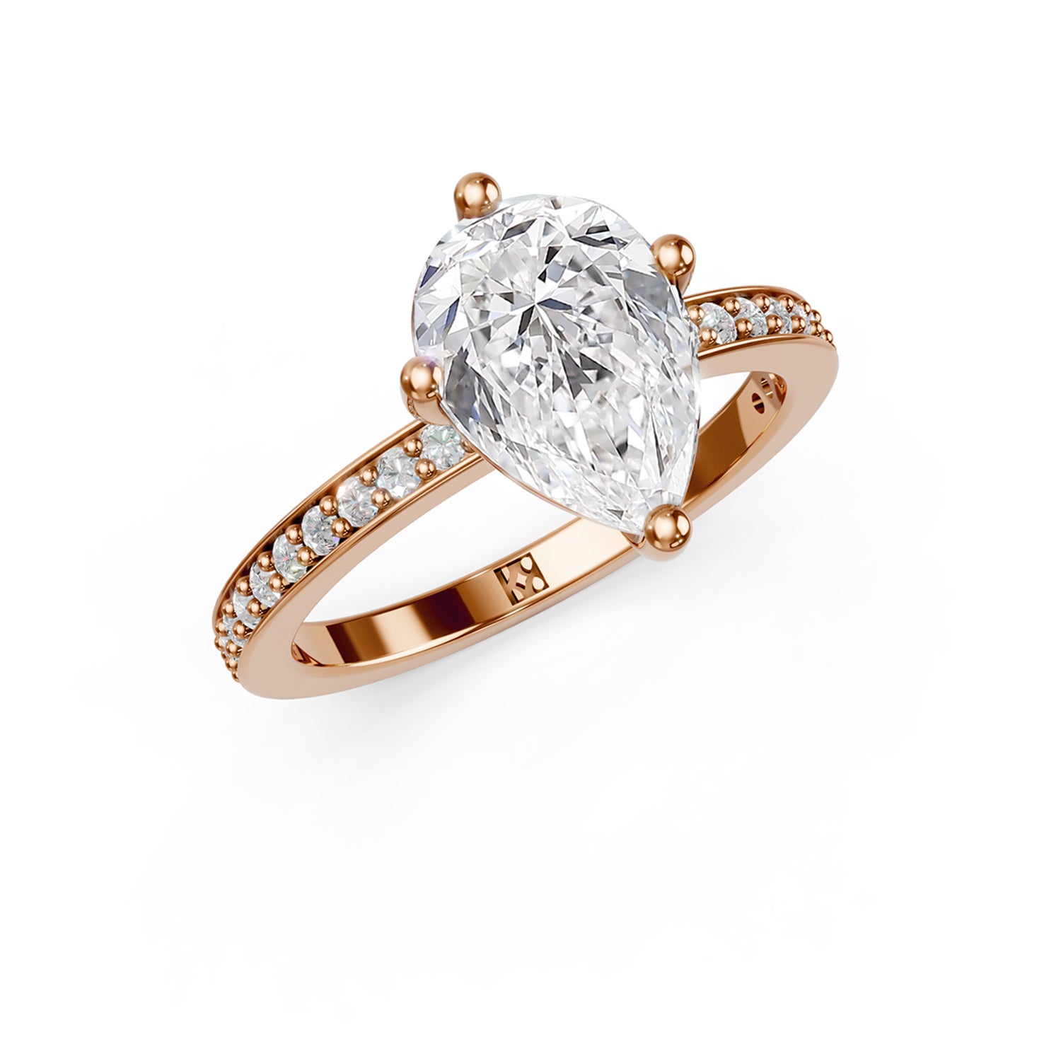 Stunning pink or rose gold Solitaire Engagement Ring with large pear-shaped  diamond and sparkling diamonds running down the narrow band. Made in Montreal. Contemporary and Classic Design. Perfect for a Millennial Bride /  Marriage Montréal Bague de fiancailles haut de gamme Bijoux Montréal