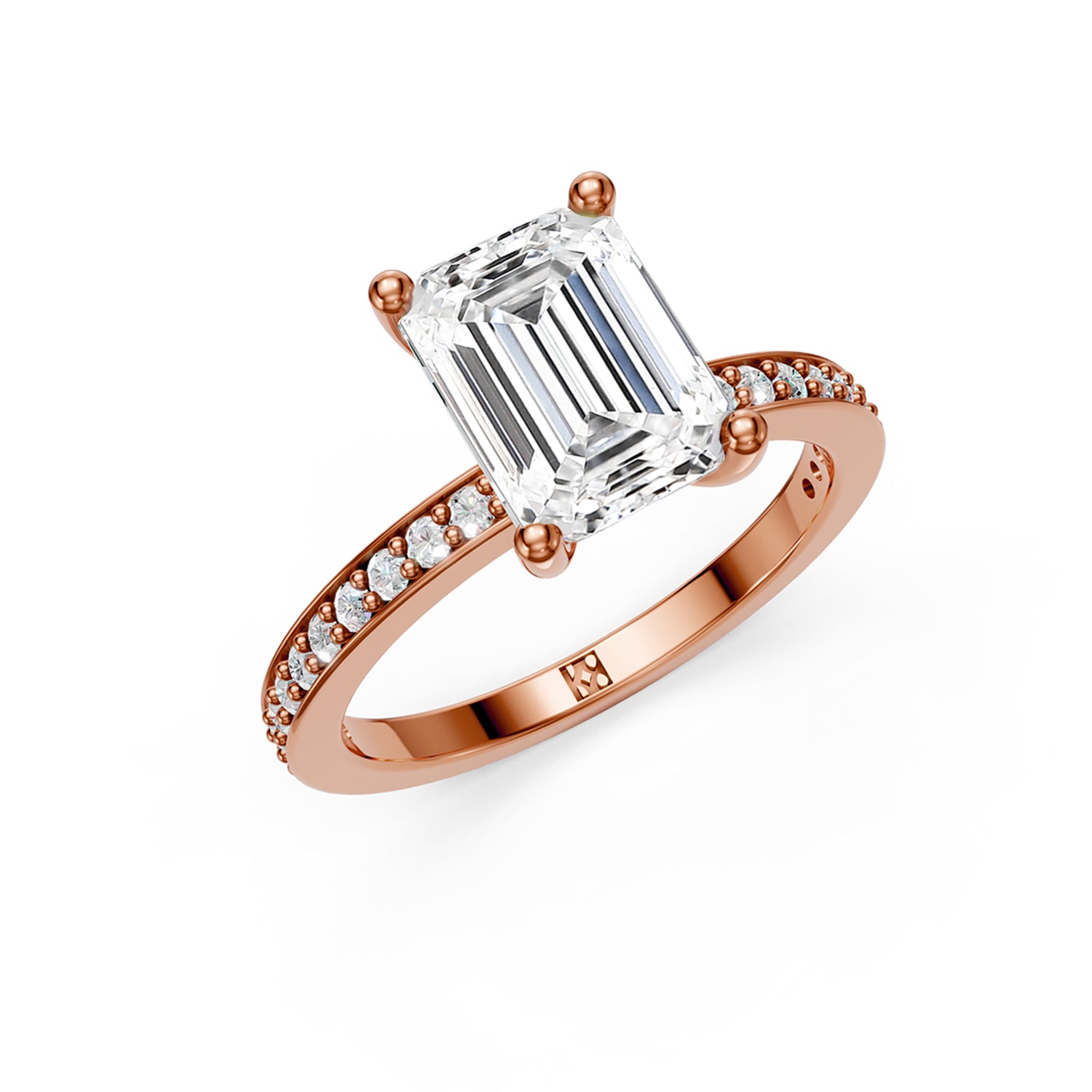 Stunning pink or rose gold Solitaire Engagement Ring with large emerald shaped  diamond and sparkling diamonds running down the narrow band. Made in Montreal. Contemporary and Classic Design. Perfect for a Millennial Bride /  Marriage Montréal Bague de fiancailles haut de gamme Bijoux Montréal