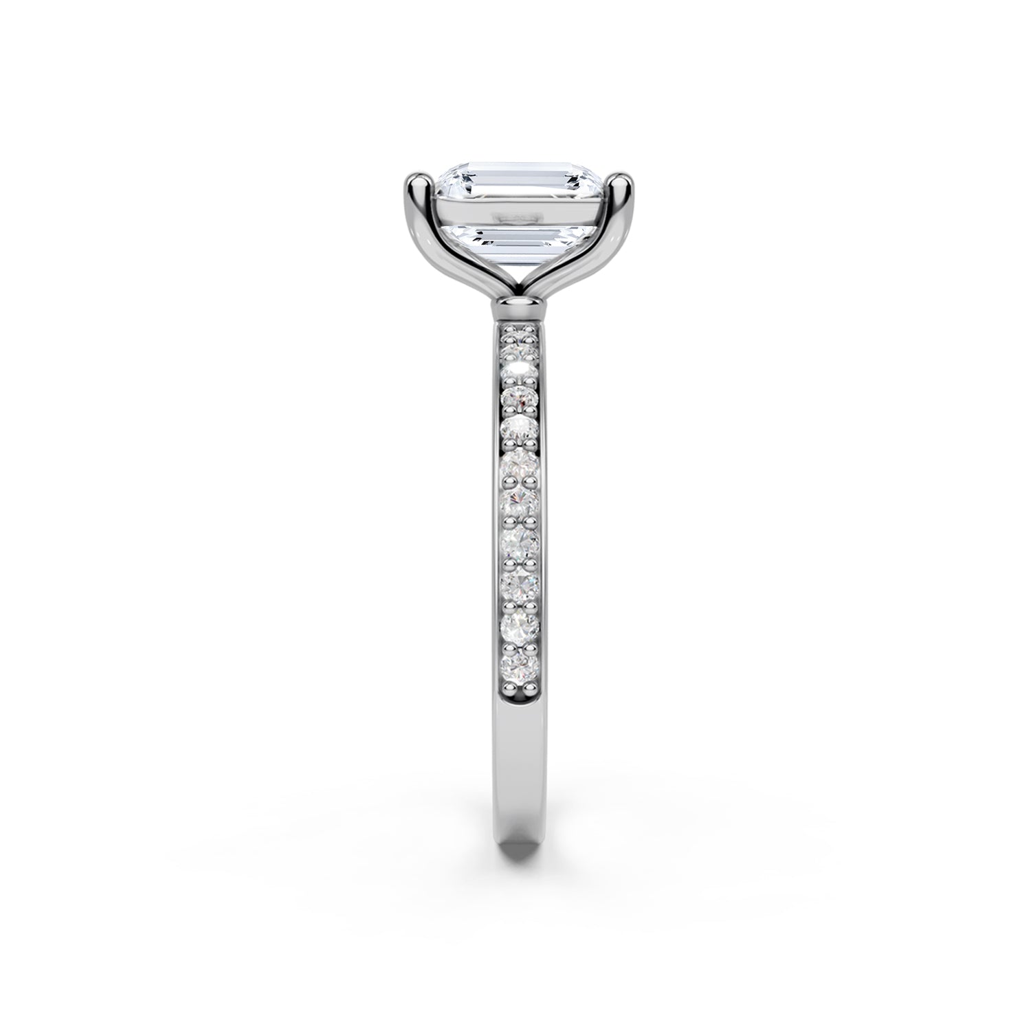 Stunning platinum or white gold Solitaire Engagement Ring with large emerald shaped  diamond and sparkling diamonds running down the narrow band. Made in Montreal. Contemporary and Classic Design. Perfect for a Millennial Bride /  Marriage Montréal Bague de fiancailles haut de gamme Bijoux Montréal