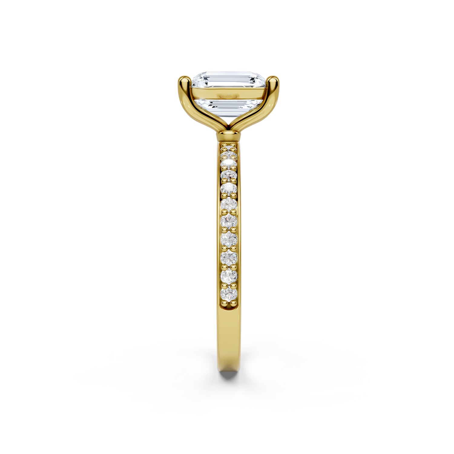 Stunning yellow gold Solitaire Engagement Ring with large emerald shaped  diamond and sparkling diamonds running down the narrow band. Made in Montreal. Contemporary and Classic Design. Perfect for a Millennial Bride /  Marriage Montréal Bague de fiancailles haut de gamme Bijoux Montréal