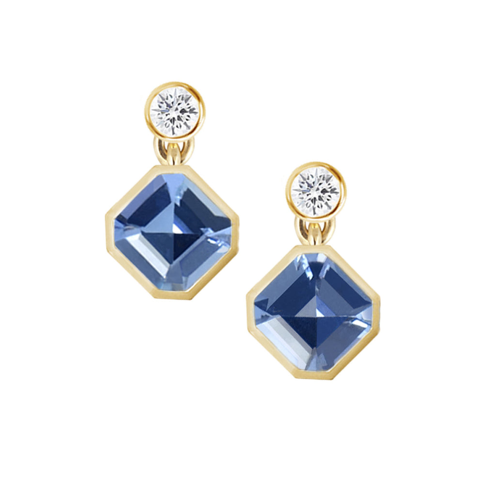 Light blue sapphire studs earrings shown from the front. Asscher cut sapphires with diamonds in bezel setting. Fine designer jewelry made in Montreal by K8 Jewelry Bijoux.